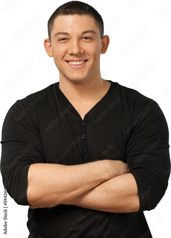 Smiling Young Man Standing with Arms Folded - Isolated Smiling Young Man Standing with Arms Folded - Isolated