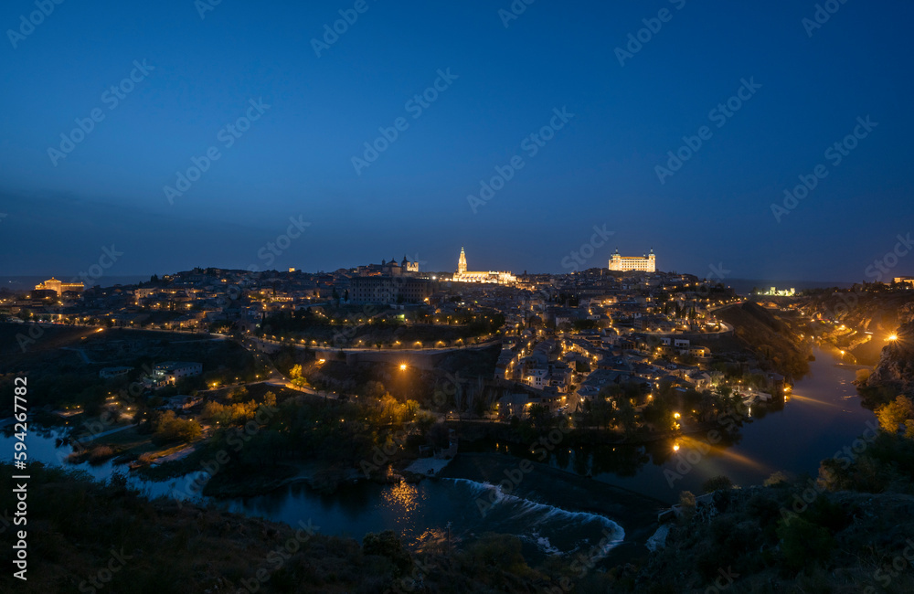 Toledo, Spain - April 9, 2023: Panoramic view of the city of Toledo at night
