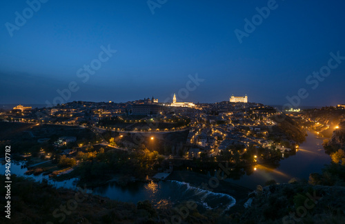 Fototapeta Naklejka Na Ścianę i Meble -  Toledo, Spain - April 9, 2023: Panoramic view of the city of Toledo at night