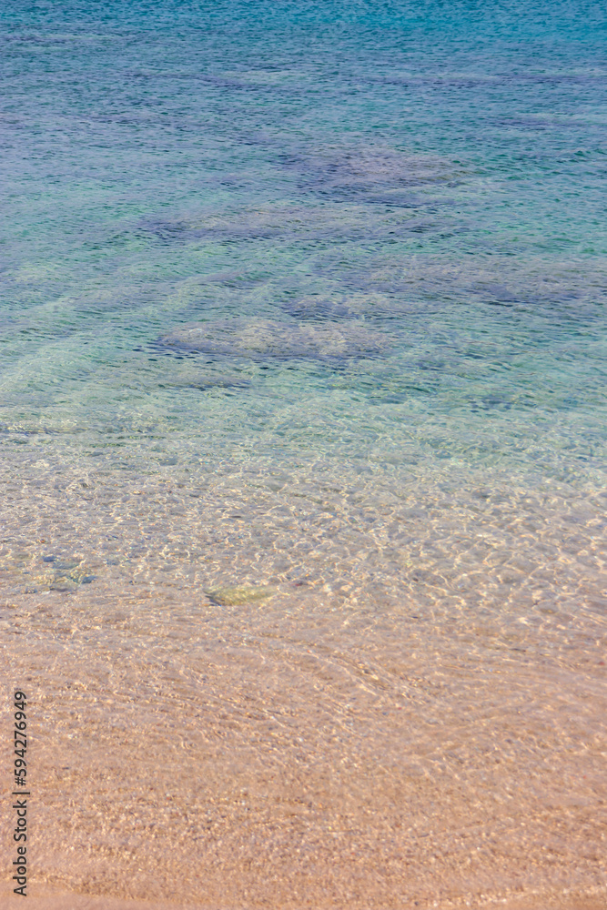 Clear water at the St Paul's bay beach creating a turquoise and brown gradient