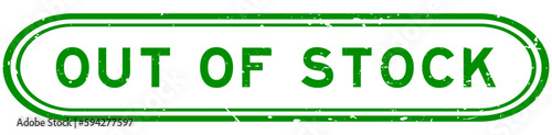 Grunge green out of stock word rubber seal stamp on white background