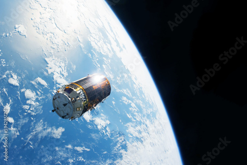 Fototapeta Naklejka Na Ścianę i Meble -  A spaceship above the earth. Elements of this image furnished NASA.