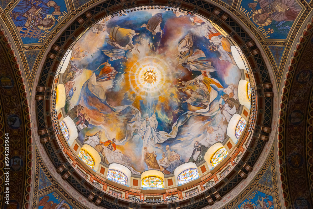 The Szeged Votive Church, a place of Christian worship and spirituality, is adorned with stunning frescos and mural paintings that reflect its faith-based architecture.