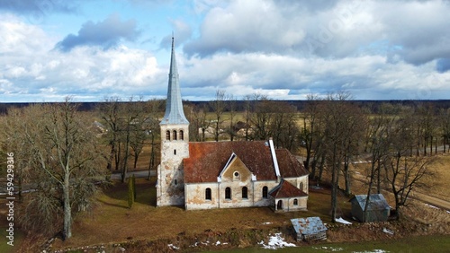 Lutheran church on the outskirts of the Latvian village of Kabile in early April 2023 photo
