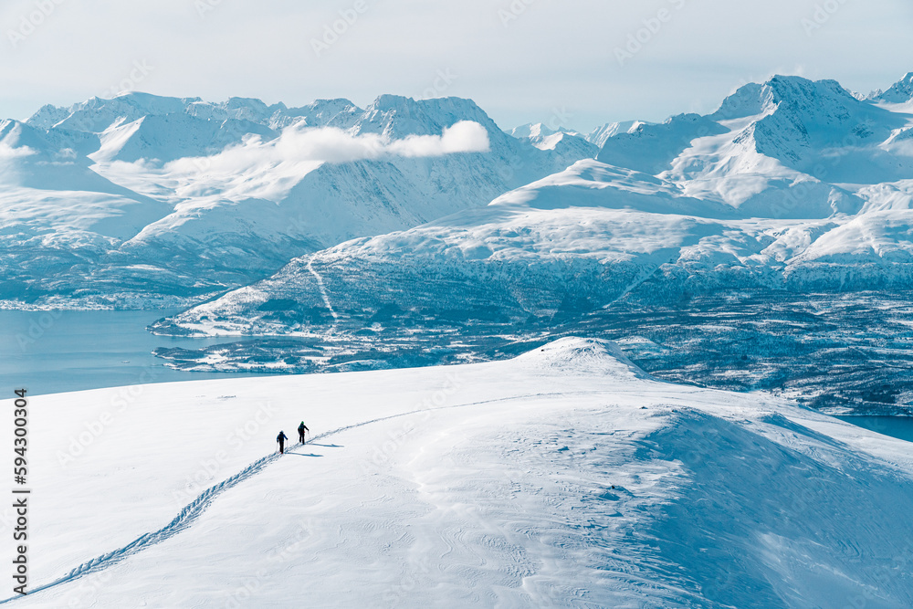 Fototapeta premium Ski alpinist looking the view on the Lyngen Alps, Norway 