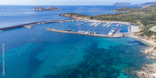 Port of teulada and aerial view of porto tramatzu beach in south sardinia 