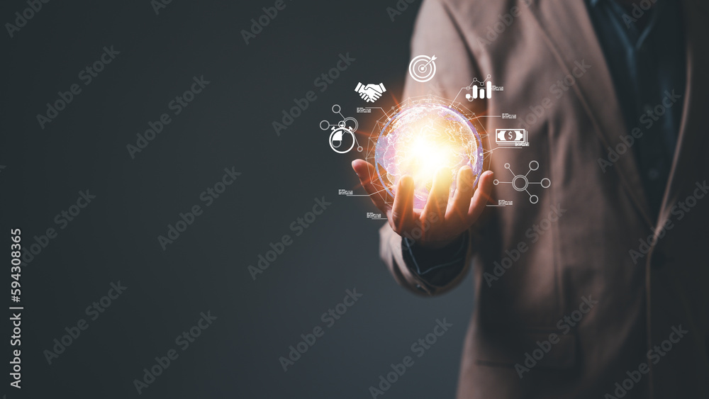 Businessperson confidently holds globe, symbolizing global reach, influence harness power of electronic, cloud computing technologies to manage large amounts of information, drive worldwide enterprise - obrazy, fototapety, plakaty 