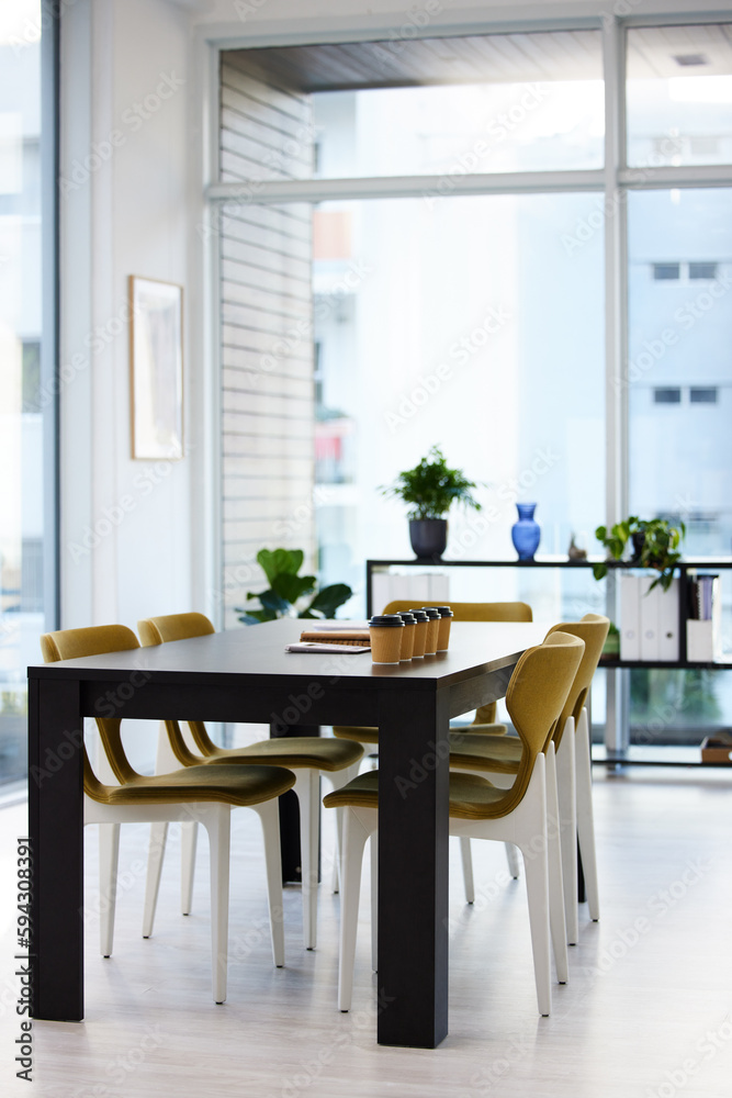 Brilliant ideas are discovered in here. coffee and paperwork on a desk in an empty office during the day. Brilliant ideas are discovered in here. coffee and paperwork on a desk in an empty office during the day.