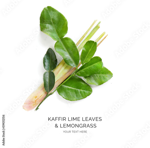 Creative layout made of kaffir lime leaves and lemongrass on white background. Flat lay. Food concept. Macro concept.