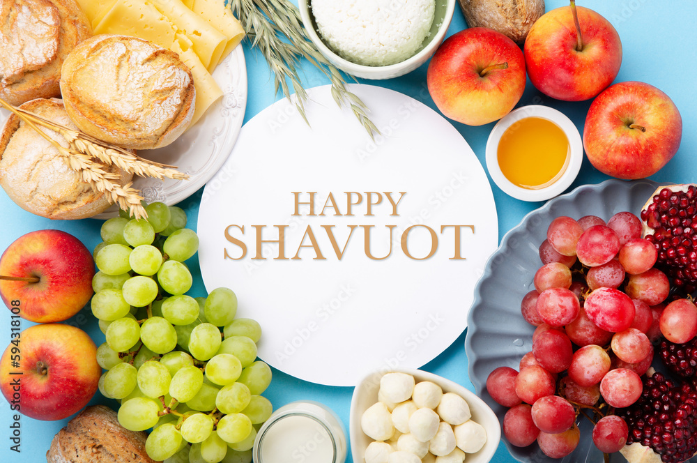 Jewish Shavuot Holiday Card. Dairy Products, Grapes, Cheese, Bread, Milk on Blue Background.