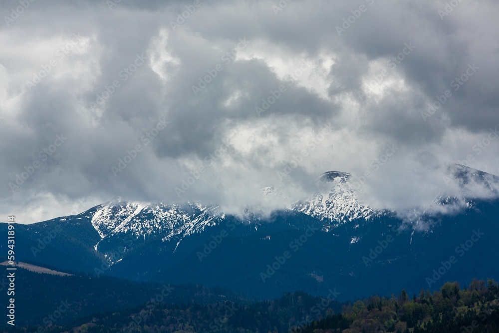 View of mountains covered with clouds. Romania.