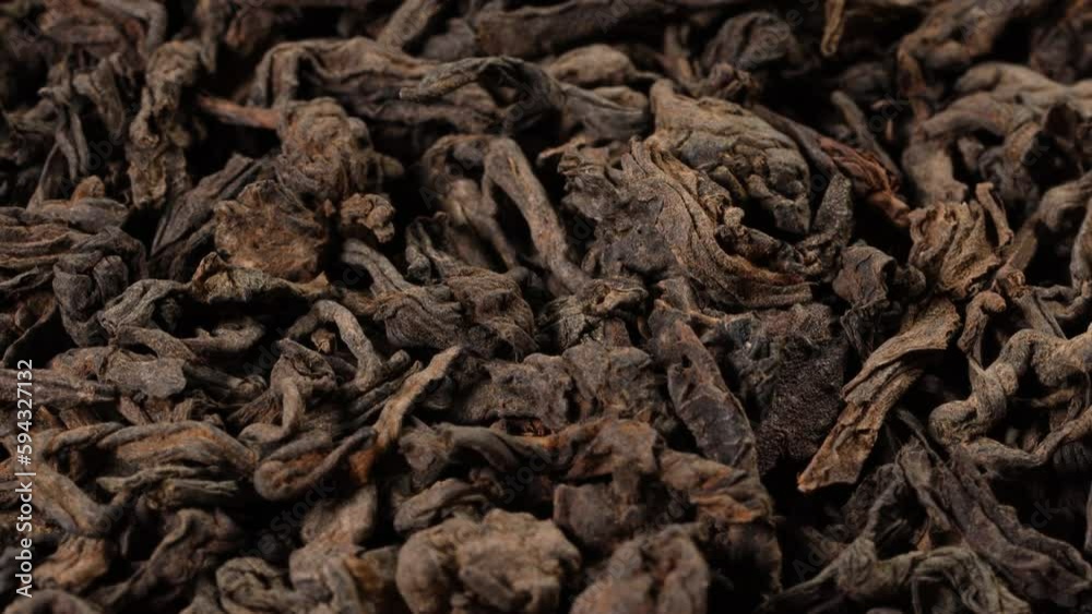 smooth traveling dolly shot closeup of dark Puer tea smooth traveling dolly shot closeup of dark Puer tea