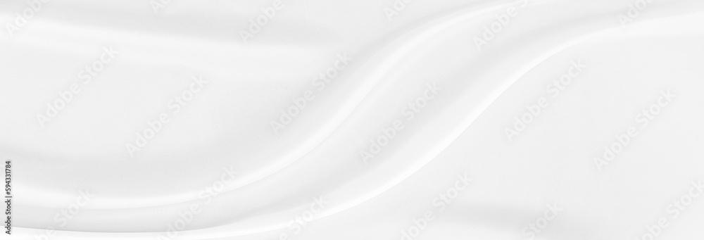 White gray satin texture that is white silver fabric silk panorama background with beautiful soft blur pattern natural.