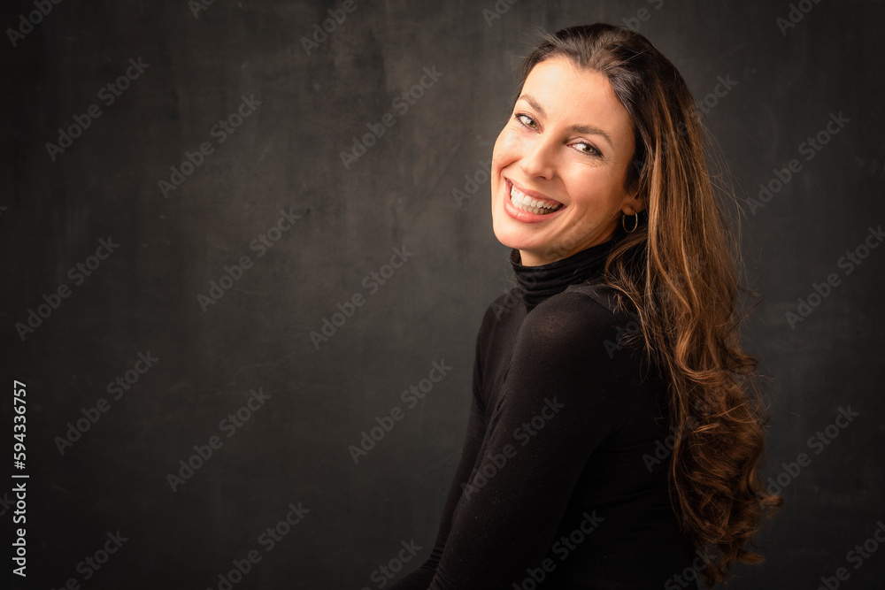 Beautiful brunette haired woman studio portrait against at isolated background Beautiful brunette haired woman studio portrait against at isolated background