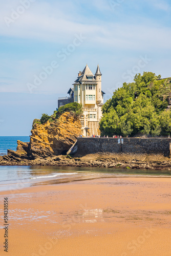 Villa Belza and rocks of the Cote des Basques beach in Biarritz, France on a summer day