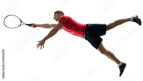 Sportive young man playing tennis