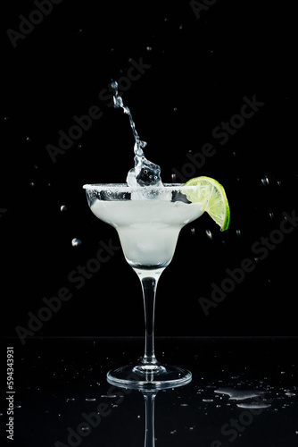 Margarita cocktail garnished with lime.