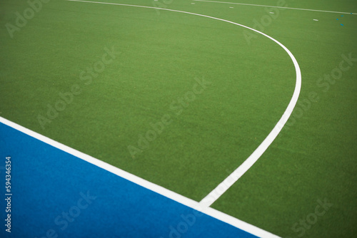 You have to play by the boundaries and rules. Closeup shot of markings on a hockey field.