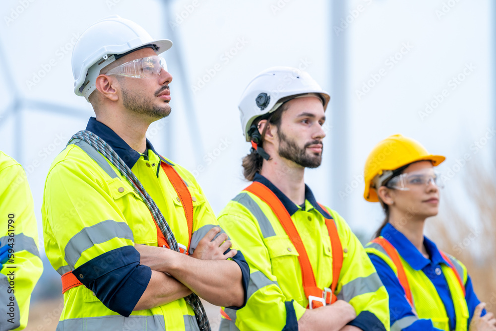 Maintenance engineer man working in wind turbine farm,Wind turbine operations that transform wind energy into electrical electricity,Clean energy concept saves the world. Maintenance engineer man working in wind turbine farm,Wind turbine operations that transform wind energy into electrical electricity,Clean energy concept saves the world.