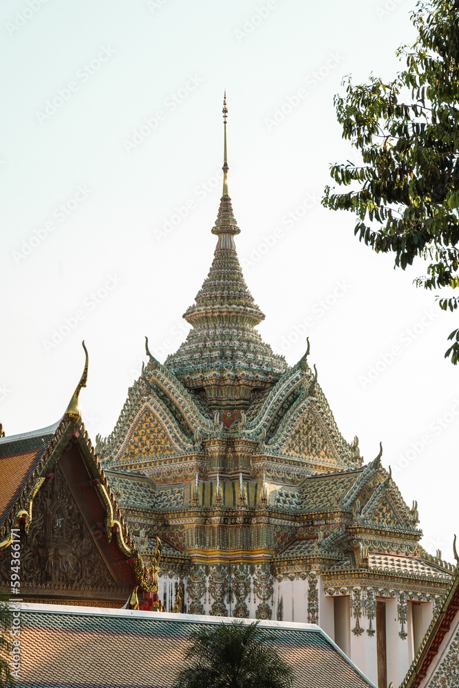 Scenic shot of Wat Pho Buddhist temple with its rich ornamentation. Bangkok, Thailand.
