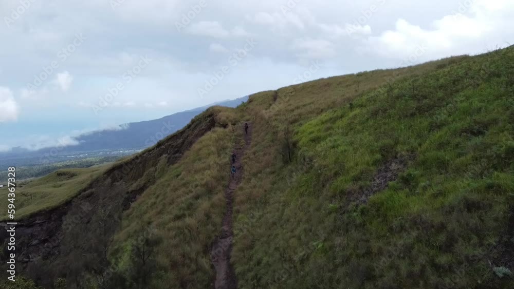 Savanna and valley on torean trail mount rinjani, Lombok, West Nusa Tenggara, Indonesia. It is a mountain that is of interest to foreign tourists Savanna and valley on torean trail mount rinjani, Lombok, West Nusa Tenggara, Indonesia. It is a mountain that is of interest to foreign tourists