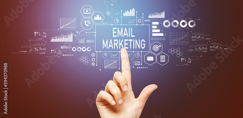Email marketing with hand pressing a button on a technology screen