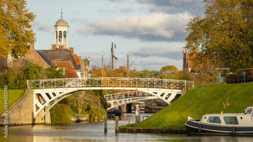 Historic place Dokkum with bridges in Friesland the Netherlands seen from the water photo