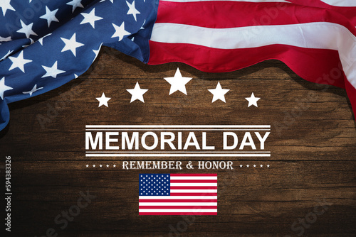 Memorial Day background design. American flag on a background of wooden table with a message. Remember and Honor.