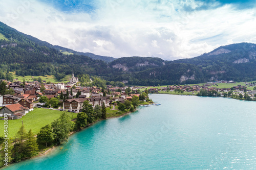 View of lake Lungern with green fields in summer, Switzerland