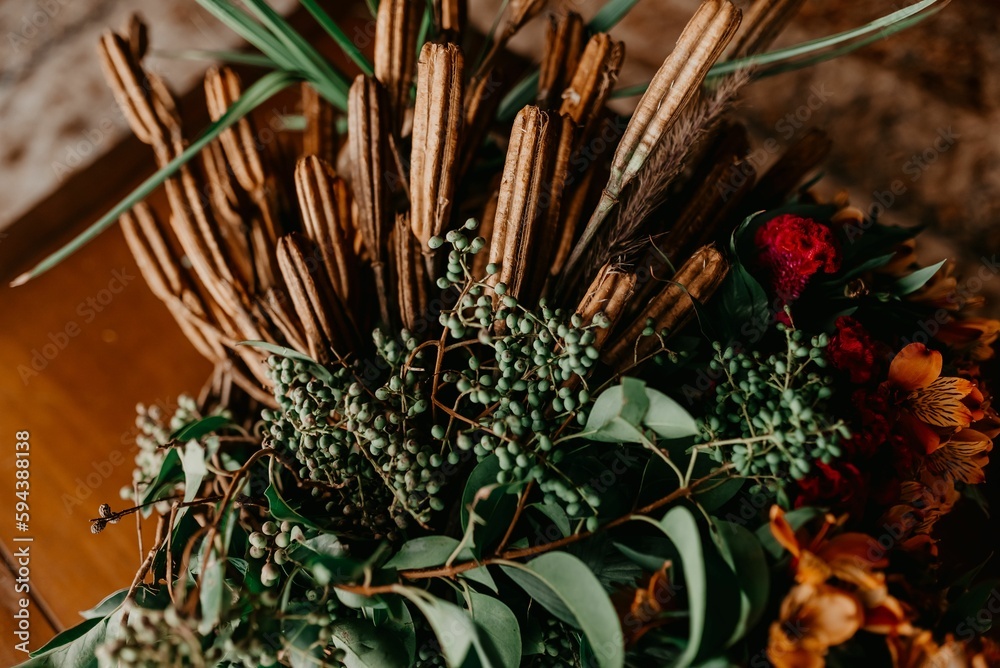 Fototapeta premium Closeup of floral decorations and bouquets on the table for a wedding celebration