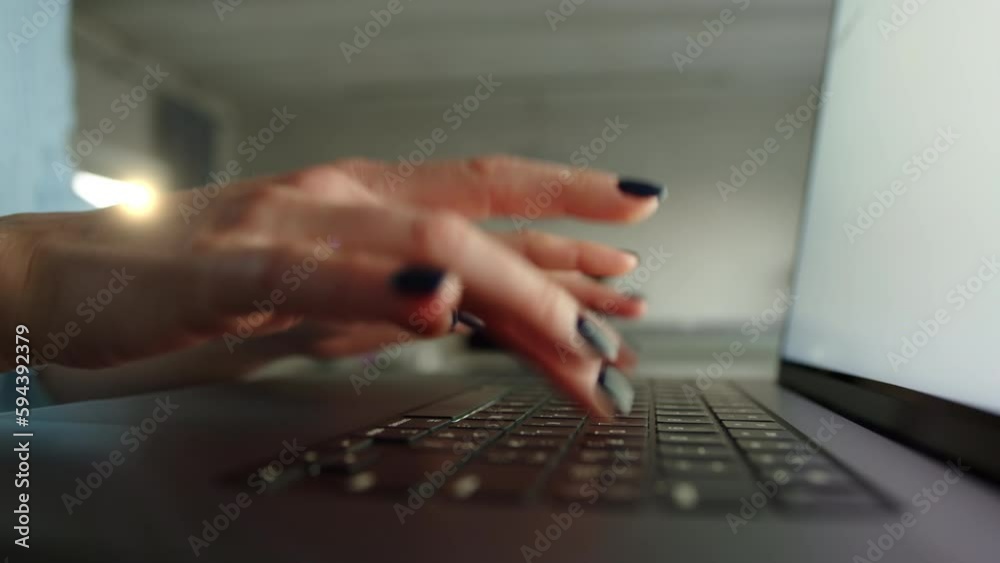 Close up of female tidy hands with polished nails rubbing them and then typing on notebook keyboard. The woman works at home. The room in the background. High quality 4k footage Close up of female tidy hands with polished nails rubbing them and then typing on notebook keyboard. The woman works at home. The room in the background. High quality 4k footage