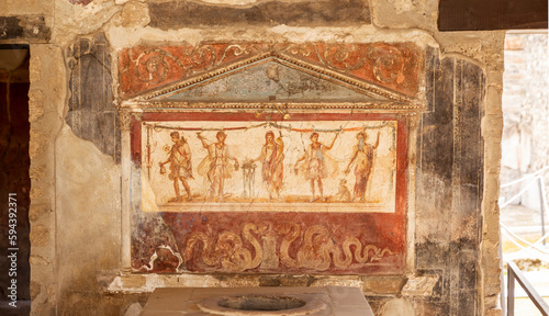 Fresco on a wall of villa in Pompeii archaeological park near Naples city, Italy