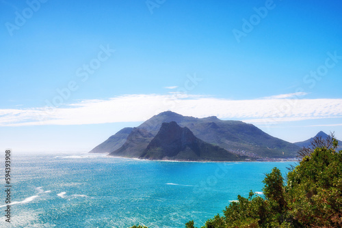 A photo of mountains, coast and ocean from Shapmanns Peak,. A photo mountains, coast and ocean from Shapmanns Peak, with Hout Bay in the background. Close to Cape Town.
