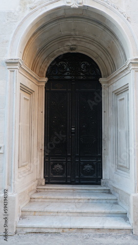 old wooden door in the city © Emircan