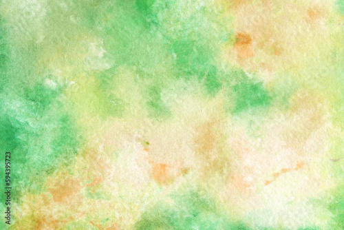 Bright multicolored watercolor texture. Abstract hand-drawn background in green and yellow colors.