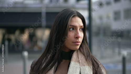 Wallpaper Mural Portrait of a Middle Eastern young woman standing in city street with confident expression Torontodigital.ca