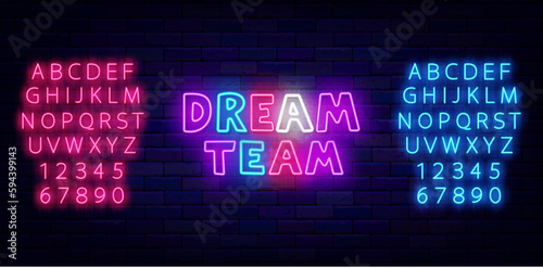 Dream team neon emblem on brick wall. Shiny typography. Shiny pink and blue alphabet. Vector illustration