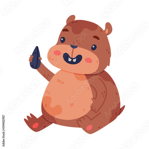 Cute Hamster Character with Stout Body Sitting with Seed Vector Illustration