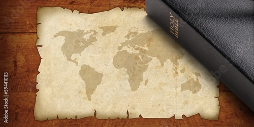 Modern world map and Holy Bible book