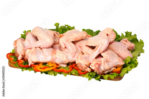 raw chicken wing on cutting board on white background