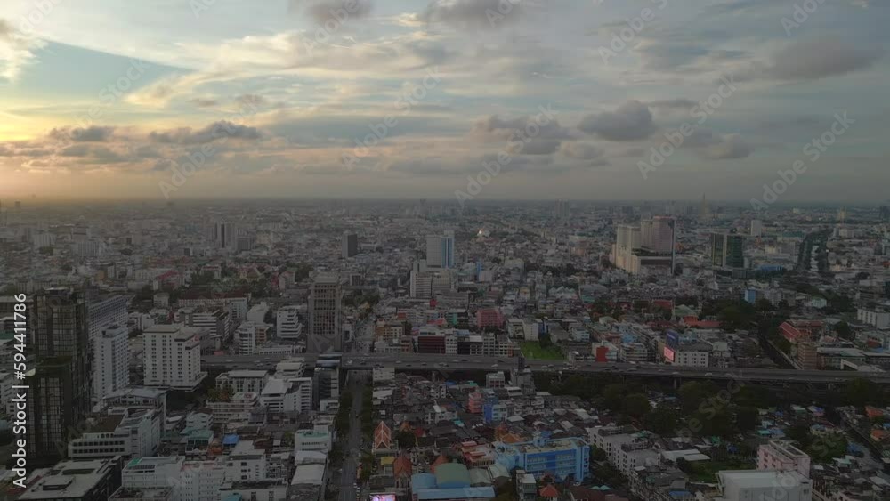 sunset over asian big city bangkok. Spectacular aerial top view flight drone sunset over asian big city bangkok. Spectacular aerial top view flight drone