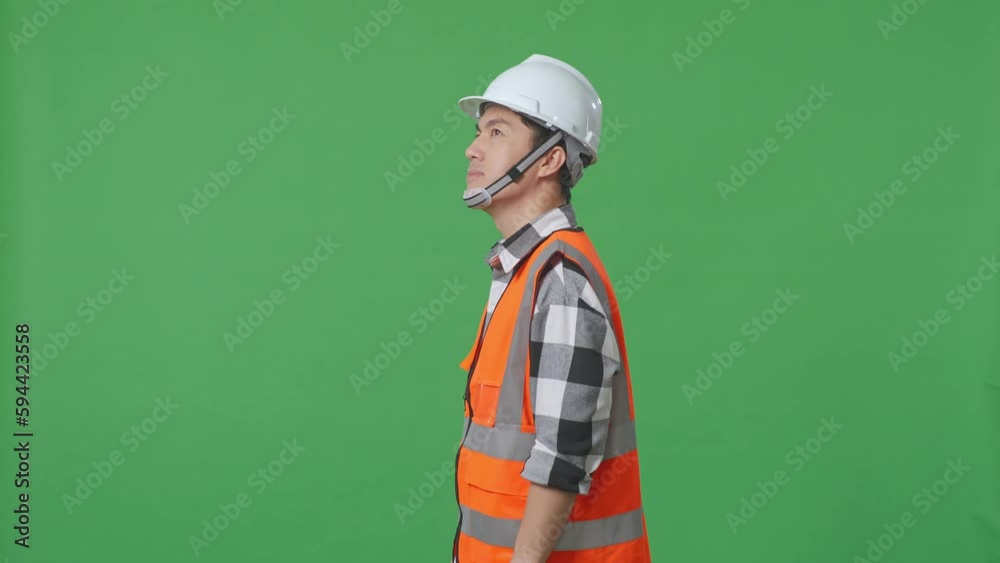 Side View Of Asian Male Engineer With Safety Helmet Looking Around While Standing In The Green Screen Background Studio
Side View Of Asian Male Engineer With Safety Helmet Looking Around While Standing In The Green Screen Background Studio