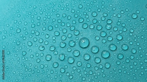 water drops close-up on a blue background