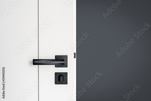 door knob with latch at hotel room with stylish interior photo