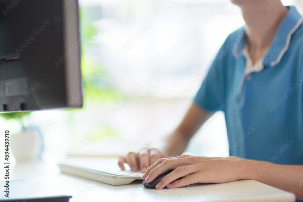 Teenager working on computer. Student with laptop. Teenager working on computer. Student with laptop.