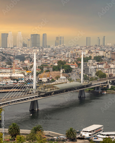 Aerial view of Golden Horn Metro Bridge, or Halic Metro Koprusu, before sunset, Istanbul city, Turkey photo