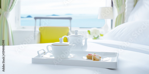 Luxury tourist resort breakfast in hotel room with stunning ocean view 