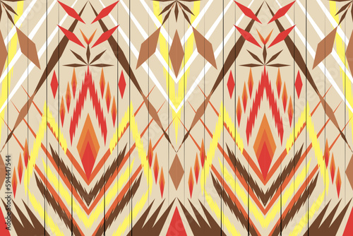 Colorful geometric ethnic seamless pattern design for wallpaper, background, fabric, curtain, carpet, clothing, and wrapping.
