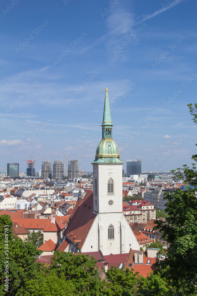 Fototapeta premium Beautiful view of St. Martin's Cathedral on the banks of the Danube in the old town of Bratislava, Slovakia on a sunny summer day 