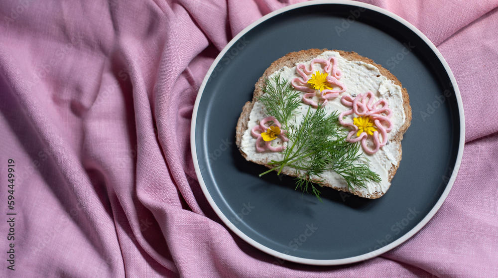 creative sandwich with soft cheese and pink pasta tarama greens, flowers creative sandwich with soft cheese and pink pasta tarama greens, flowers